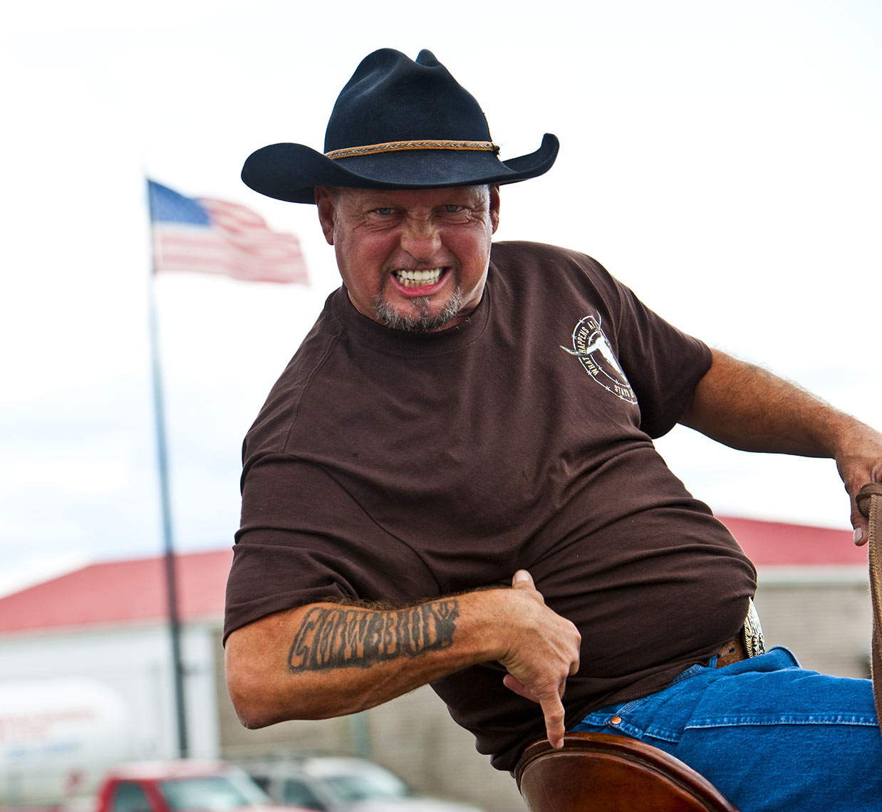 Raleigh editorial photography Bryan Regan Mule days Benson cowboy and flag